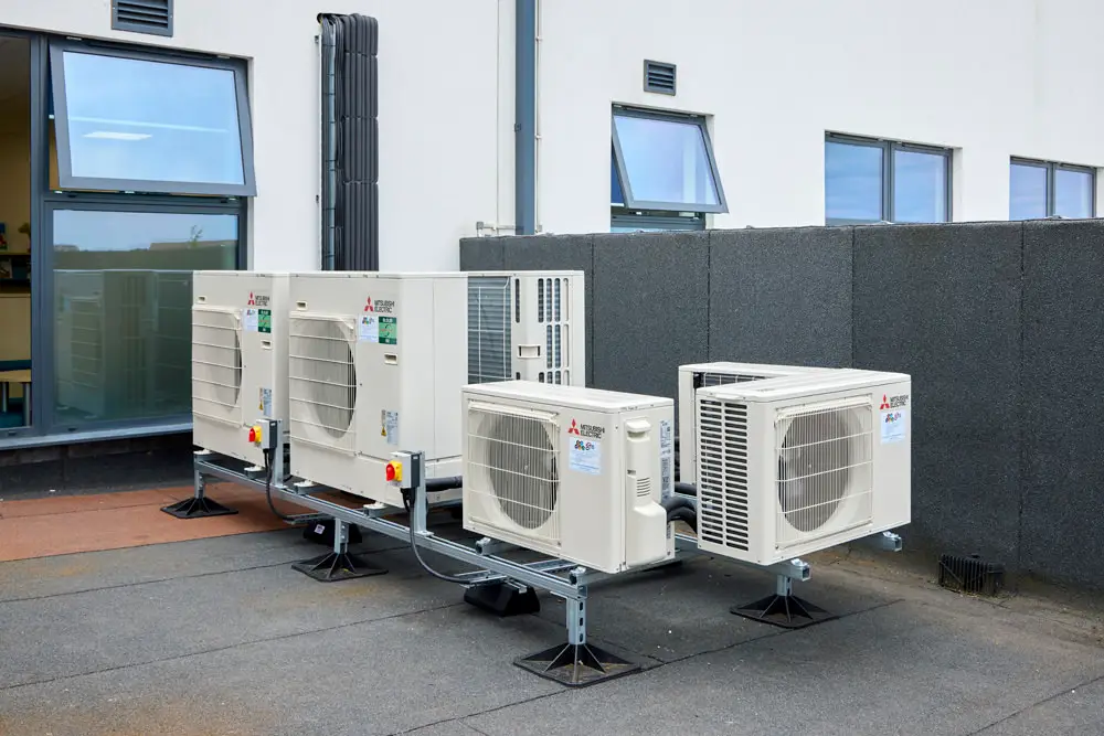 4 air conditioning units outside