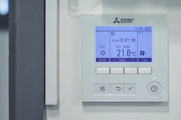 An Air conditioning panel on a wall